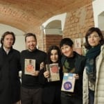 Los autores de "Nos Habita" en la presentación en Milán